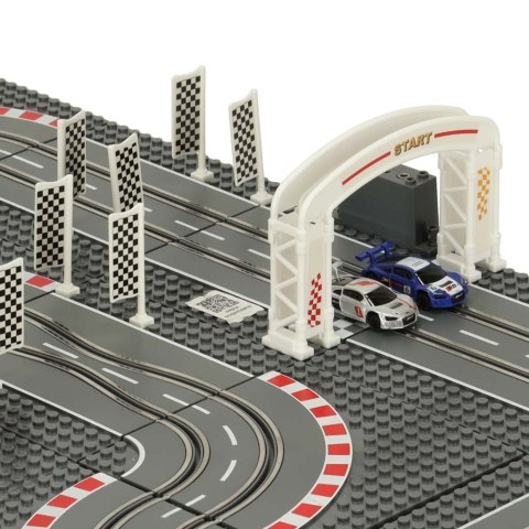 Tor wyścigowy samochodowy elektryczny policyjny 2 auta autka kontrolery zakręty klocki konstrukcyjne GD-02 Tor wyścigowy samochodowy elektryczny policyjny 2 auta autka kontrolery zakręty klocki konstrukcyjne GD-02